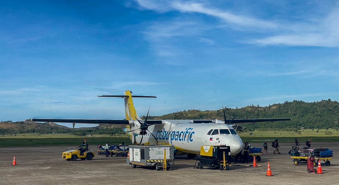 turboprop-airplane-parked-at-an-airport-tarmac-i0lmoc5udgy